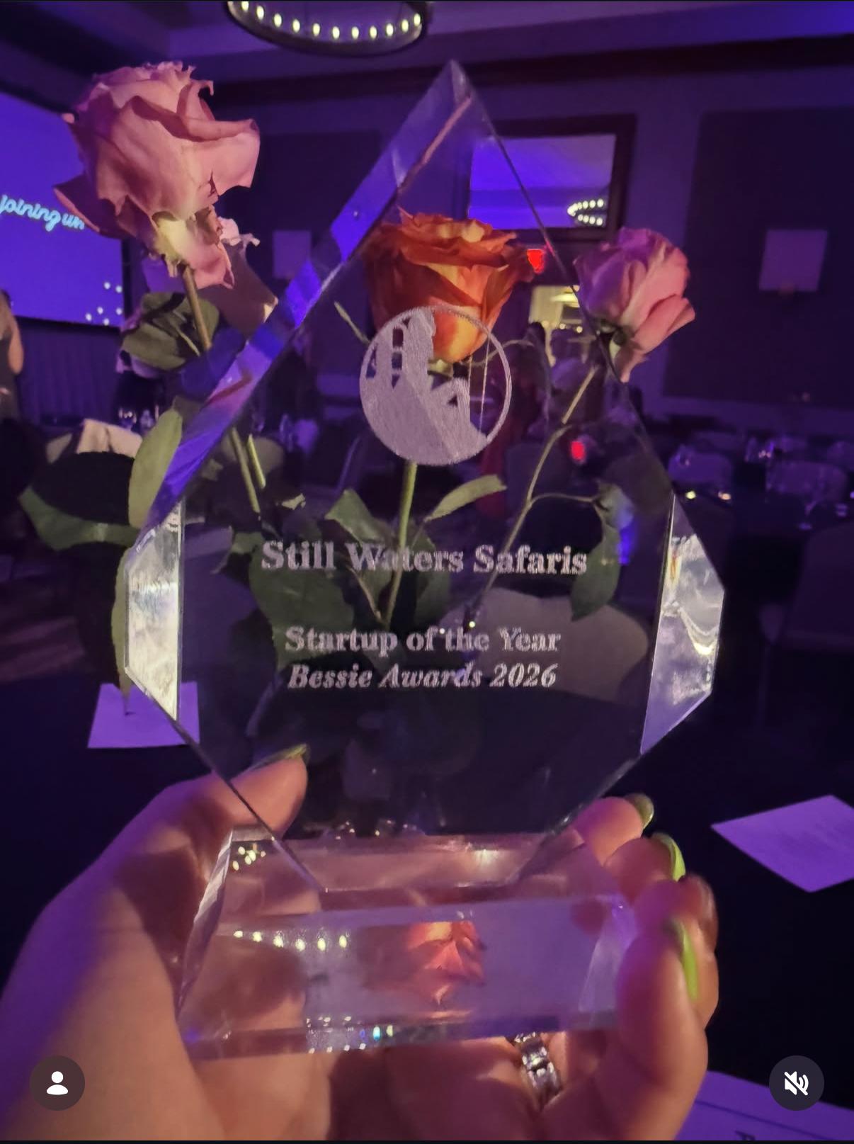 Still Waters Safaris holding the 2026 Bessie Award — Startup of the Year